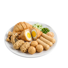 Fototapeta premium Traditional Indonesian Pempek Palembang Assorted Savory Fish Cakes with Egg on White Plate Isolated