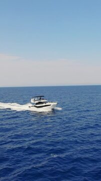 Luxury Yacht Sailing Across Blue Mediterranean Sea