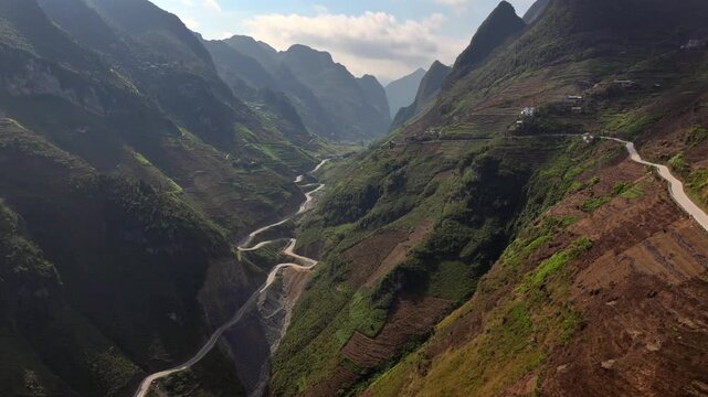 The winding road of Ma Pi Leng Pass in Vietnam. A Part of a Famous Ha Giang Loop. Beautiful destinations Asia. Aerial.