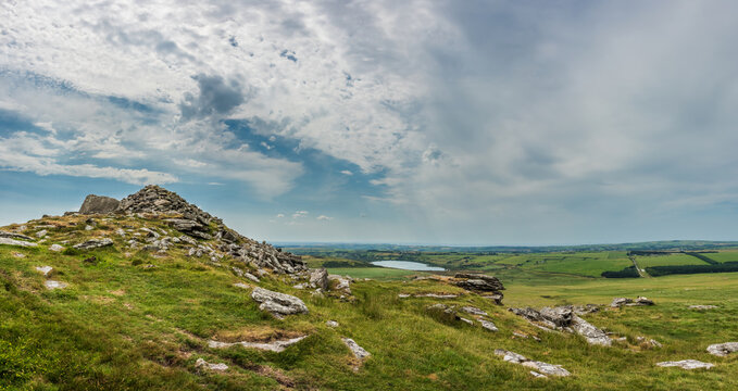 Lovely Summer day landscape image of Rough Tor on Bodmin Moor in English countryside