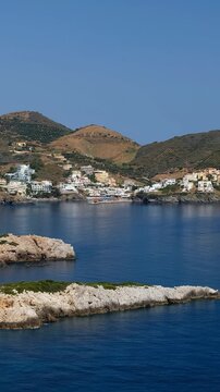 Vertical video of the seaside resort of Bali located in a large gulf. Crete. Greece