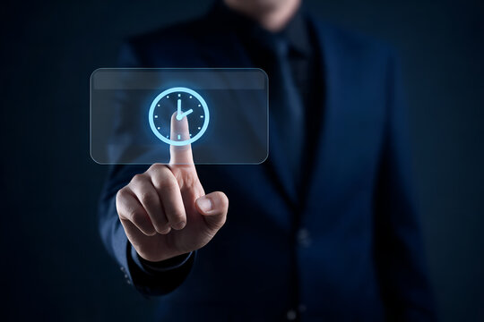 Close up of businessman finger touching digital clock icon on futuristic interface time management and punctuality concept