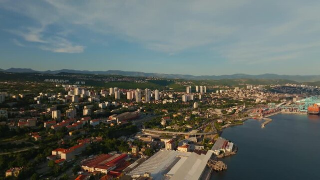 Aerial perspective of Rijeka seaside cityscape and harbor during summer
