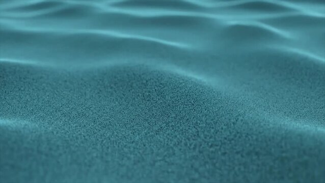 Close-up view of a textured teal surface with gentle, undulating ripples, resembling a sandy seabed or soft fabric.
