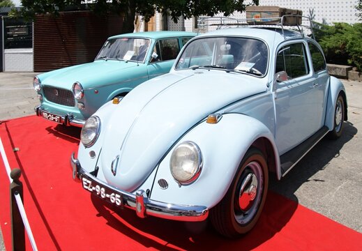 Volkswagen Beetle and Fiat 1100 classic cars an exhibition