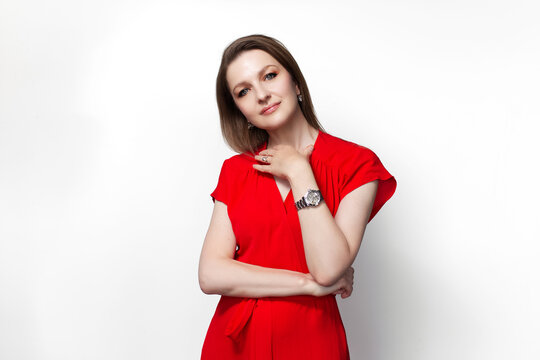 Young girl in red dress. Isolated on white background.