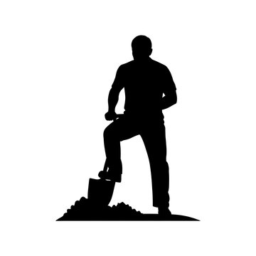 Silhouette of a man digging with a shovel