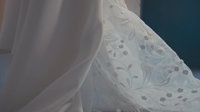 Soft Light Moving Across Elegant Lace Wedding Dress