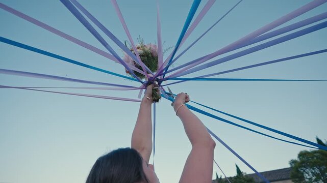Wedding Ribbon Ceremony with Guest Cutting Ribbon from Bouquet