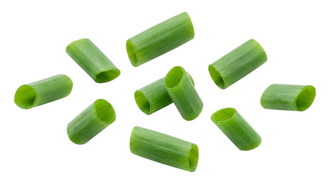 Sliced scallions scattered on transparent background