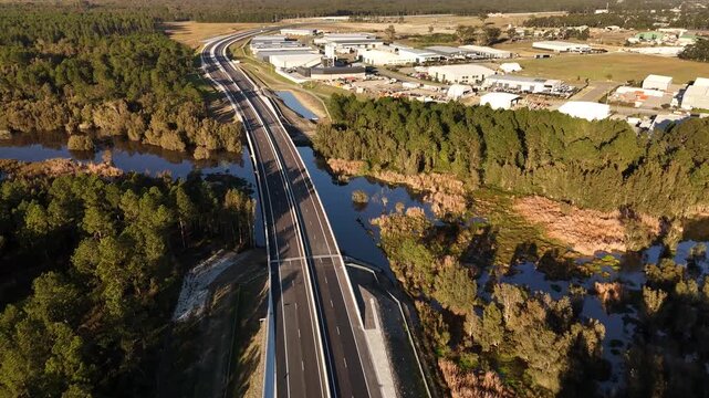 Aerial drone view of the M1 Pacific Motorway Extension project at Heatherbrae, Newcastle, NSW Australia heading south toward Masonite Road on 26 July 2026