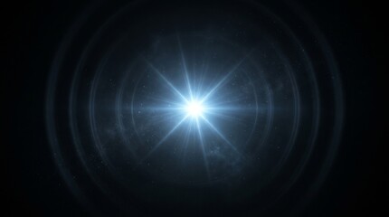 Brilliant blue starburst light flare glowing intensely in dark space surrounded by faint concentric rings and stardust © Dilsara