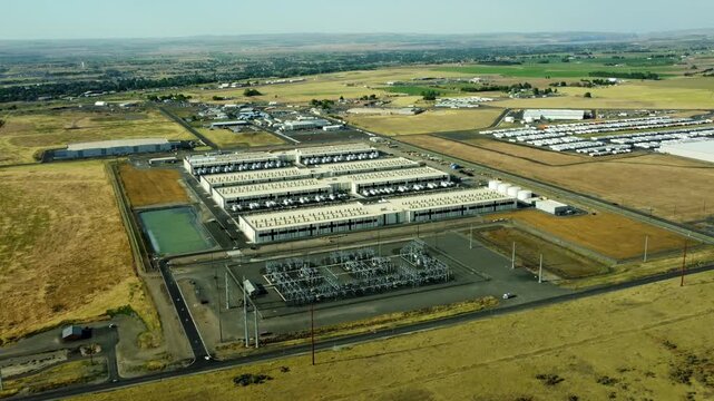 US, Oregon, Hermiston, 2026-05-27 - Drone view of an Amazon Data Center serving AWS on us-west at the Penney Campus, in Summer