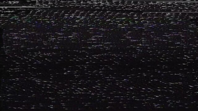 Abstract digital glitch effect with static noise on black screen.