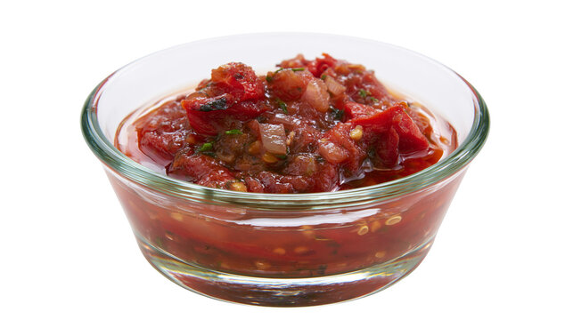Fresh tomato salsa with onions and herbs in glass bowl