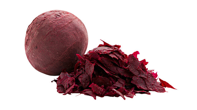 Whole beet root and pile of dried beet chips