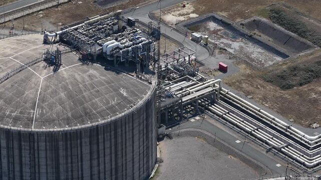 Aerial view of lng terminal industrial gas storage tank
