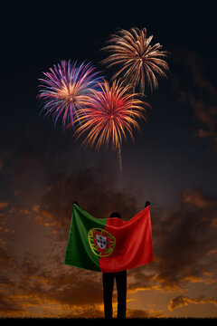 Girl with National flag of Portugal on Independence day