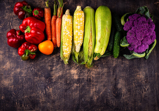 Corn, pepper, cauliflower, carrot, cucumber, tomato and zucchini
