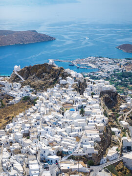 Aerial view of the main town Hora on Serifos island, Cyclades, Greece, with the bay and port of Livadi in the background