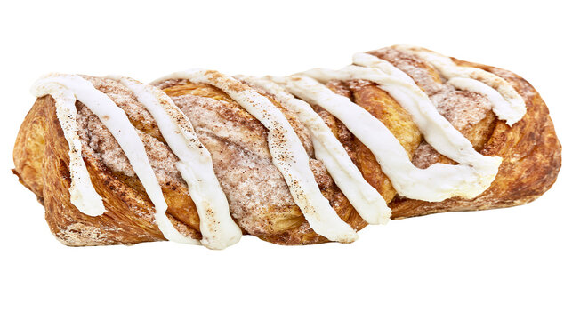 Twisted cinnamon pastry with white icing drizzle and sugar dusting