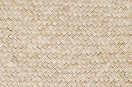 Pattern of reed weaving mat with vintage style for background and design art work.