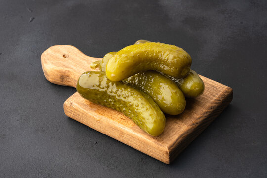 Fresh Homemade Crunchy Gherkin Pickles on Black  Background , Close Up Food Photography