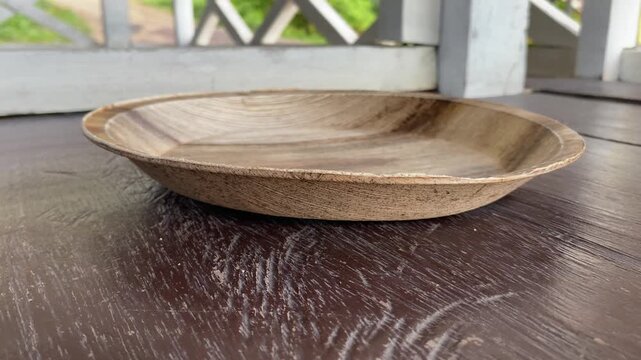 Palm Leaf plate crafted from naturally fallen palm leaves. Eco-friendly, sturdy, biodegradable disposable tableware, suitable for serving hot or cold foods sustainably. Top View.