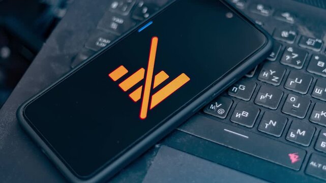 No signal concept: smartphone with disconnected network Icon on dust-covered laptop during war blackout