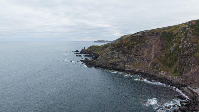 Scenic view of coastal cliffs and North Sea shoreline from Fast Castle headland in Berwickshire, Scotland