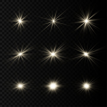 Golden set starburst sparkles with vivid shining light. Smooth radiant beams spread evenly around the bright center. High quality vector element on transparent background.
