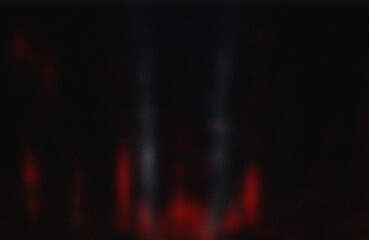 Naklejka premium Red light beams in dark space