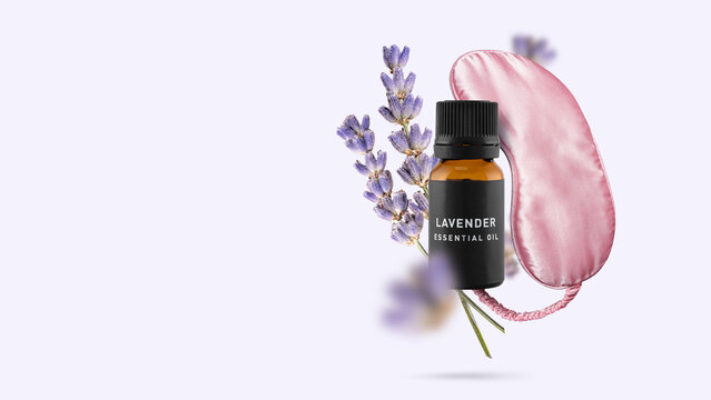 Lavender essential oil bottle, dried lavender flowers and pink silk sleep mask flying on light purple background. Creative concept of aromatherapy sleep aid, calming, peaceful night rest. Copy space