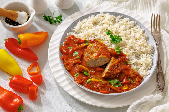 German Frikadelle in Sweet Pepper Lecho With Rice