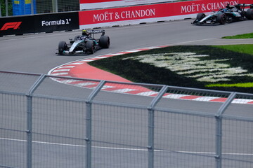 Obraz premium May 25, 2026, Montreal, Canada, Mercedes F1 car driven by Antonelli and Russell during Formula 1 action. g.