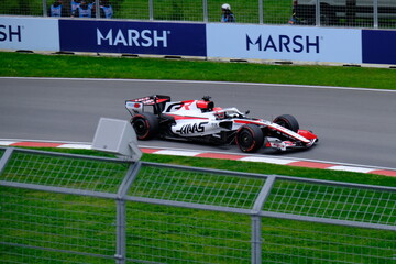 Obraz premium May 24, 2026, Montreal, Canada - Haas Formula 1 car on track by Ocon and Bearman at Circuit Gilles Villeneuve. g.