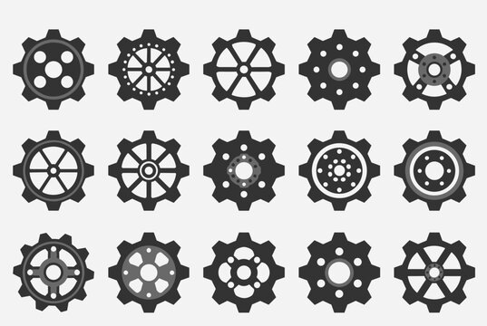 Collection of fifteen unique dark grey industrial gear cogs arranged in a grid, isolated on white background.