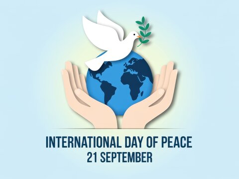 International day of peace poster design featuring a white dove holding an olive branch over a globe and hands