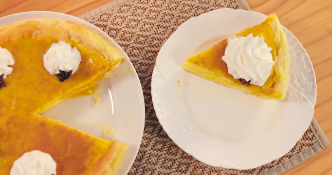Crepe cake, pastry and slice on table with cream for party event or festive holiday from above view. Pancake, delicious and sweet meal with anise for celebration, catering or eating in lounge of home