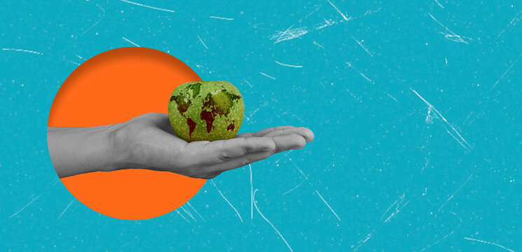 Art collage showing a hand holding a green apple shaped like the world against a bright background