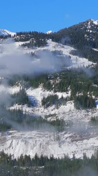 Aerial view on Canadian rocky mountain landscape covered in snow