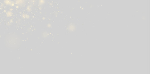 Golden stardust sparkles above transparent space. Bright glowing particles create dreamy elegance. Perfect for festive and luxury backgrounds. © NATAStock