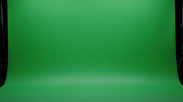 Green screen studio seamless backdrop with soft lighting for video production and advertising