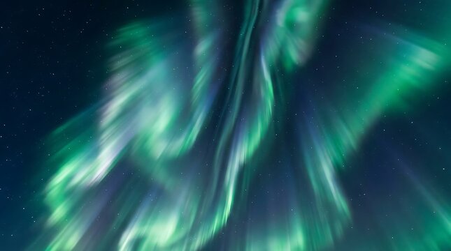 Vibrant green and blue aurora borealis light display in starry night sky.