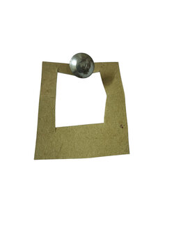 Small cardboard paper frame held by a metal push pin