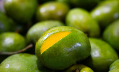 Fresh green mango close-up © ProShine Studio