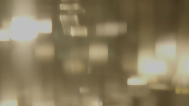 Abstract warm light leaks and bokeh creating a soft, warm, and vintage overlay effect