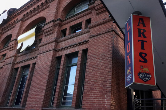 Adelaide, South Australia, Australia - December 20 2026: Historic red brick facade of the Fowler's building featuring Lion Arts Centre sign, home to the State Theatre Company and Lion Arts Factory