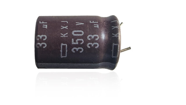 Brown electrolytic capacitor, 33 &micro;F, 350 V, with metallic leads for electronic circuits.