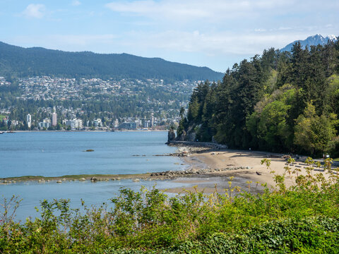 View of Douk Beach in Stanley Park on a sunny day - Vancouver BC, Canada